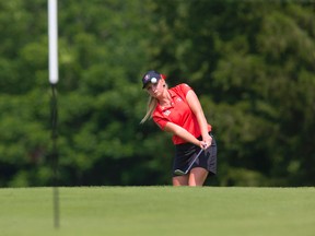 Maddie Szeryk chips onto the 18th green during the Ontario Women?s Amateur golf championship at the St. Thomas Golf and County Club in Union on Friday. She bogeyed the 18th, but won the tournament by three strokes with a seven-under-par 281 total. (DEREK RUTTAN, The London Free Press)