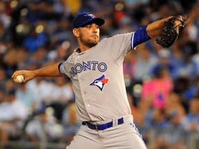 Toronto Blue Jays starting pitcher Marco Estrada (25) delivers a pitch against the Kansas City Royals in the first inning at Kauffman Stadium on July 10, 2015. (JOHN RIEGER/USA TODAY Sports)