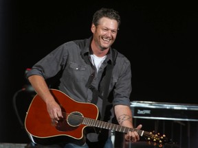 Blake Shelton performs during the Calgary Stampede at the Scotiabank Saddledome in Calgary, Alta. on Friday July 10, 2015. Jim Wells/Calgary Sun
