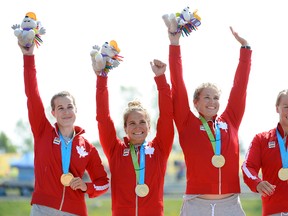 Michelle Russell, Emilie Fournel, KC Fraser and Hannah Vaughan of Canada celebrate winning in the Women K4 500m Final during the 2015 Pan Am Games at Welland Pan Am Flatwater Centre. (Eric Bolte-USA TODAY Sports)