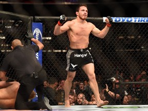 Jake Ellenberger celebrates his submission victory over Josh Koscheck in their welterweight bout during the UFC 184 event at Staples Center on February 28, 2015. (Harry How/Getty Images/AFP)