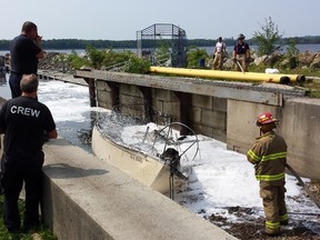 Pierre Hamel was standing on his boat nearby watching as fire burns through a boat docked at a Gatineau Marina on Saturday, July 11, 2015. Hamel remembered hearing a loud "boom" and seeing a thick cloud of smoke and smell of gasoline engulf the entire marina. 
Photos by Pierre Hamel.
Ottawa Sun/Postmedia Network