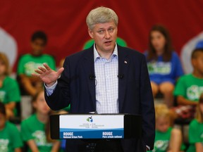 Prime Minister Stephen Harper announces the expansion of Rouge National Urban Park in Pickering, Ont., on July 11, 2015. (Jack Boland/Toronto Sun/Postmedia Network)