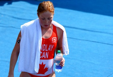 Canadian Paula Findlay walks off after finishing the Women's Triathlon during the 2015 Pan Am Games in Toronto on Saturday July 11, 2015. Dave Abel/Toronto Sun/Postmedia Network