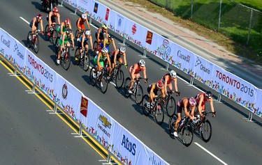 Canadian Paula Findlay in the middle of the chase group along lakeshore during the bike portion of  the Women's Triathlon during the 2015 Pan Am Games in Toronto on Saturday July 11, 2015. Dave Abel/Toronto Sun/Postmedia Network