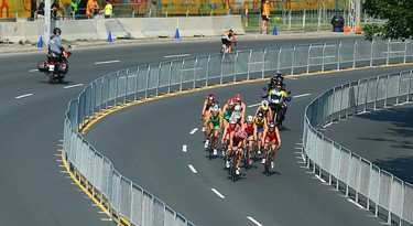 The chase group along lakeshore during the bike portion of  the Women's Triathlon during the 2015 Pan Am Games in Toronto on Saturday July 11, 2015. Dave Abel/Toronto Sun/Postmedia Network