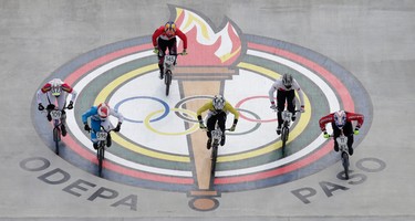 Cycling BMX Pan Am Games riders race through the Pan Am logo on Saturday July 11, 2015. Craig Robertson/Toronto Sun/Postmedia Network