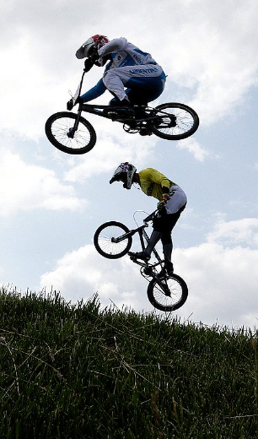 Cycling BMX Pan Am Games riders catch some air on the course on Saturday July 11, 2015. Craig Robertson/Toronto Sun/Postmedia Network
