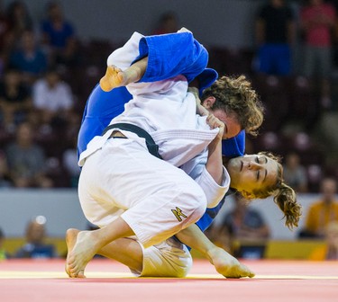 Ecaterina Guica (Canada, wearing blue) beat Angelica Delgado (USA) in the Judo Women's Under 52kg Final of Table, Contest 18, during Pan Am Games  at the Mississauga Sports Centre in Mississauga, Ont. on Saturday July 11, 2015. Ernest Doroszuk/Toronto Sun/Postmedia Network