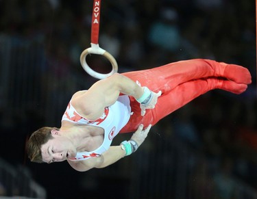 Canada's Kevin LYTWYNat the rings during the Mens Gymnastics Artistic Competition on Saturday July 11, 2015. Veronica Henri/Toronto Sun/Postmedia Network