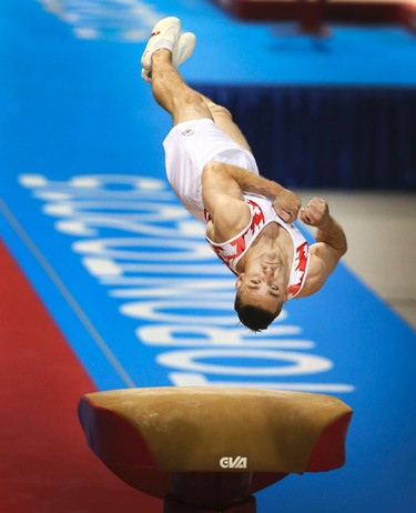 Scott MORGAN of Canada performs a floor routine in the Mens Gymnastics Artistic Competition on Saturday July 11, 2015. Veronica Henri/Toronto Sun/Postmedia Network