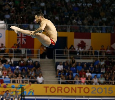 Canadian diver Francois Imbeau-Dulac competes in the 3 metre springboard the at the Pan Am Aquatic Centre in Toronto on Saturday July 11, 2015. Michael Peake/Toronto Sun/Postmedia Network