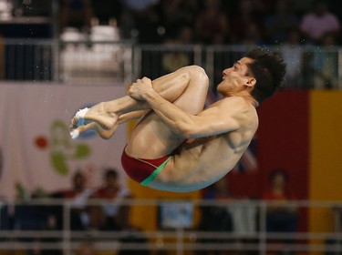 Mexican diver Rommel Pacheco won the gold medal in the 3 metre springboard the at the Pan Am Aquatic Centre in Toronto on Saturday July 11, 2015. Michael Peake/Toronto Sun/Postmedia Network