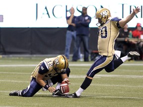 Winnipeg Blue Bombers’ Lirim Hajrullahu kicks for a field goal during a game against the BC Lions in 2014. (Carmine Marinelli/QMI Agency)