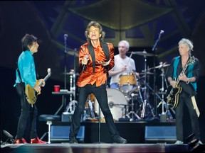 Rolling Stones' Mick Jagger works the crowd going during their "Zip Code" tour at Ralph Wilson Stadium in Buffalo on Saturday, July 11, 2015. (Carlos Ortiz/Democrat & Chronicle via AP)