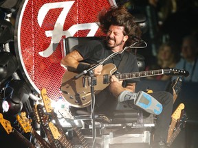 Dave Grohl of the Foo Fighters plays Monkey Wrench on their first of two nights at the Molson Amphitheatre in Toronto, Ont., on Wednesday July 8, 2015. (Jack Boland/Toronto Sun/Postmedia Network)