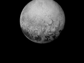 This photo obtained July 12, 2015, from NASA shows New Horizons' last look at Pluto's Charon-facing hemisphere revealing intriguing geologic details that are of keen interest to mission scientists. (AFP PHOTO/NASA/HANDOUT)