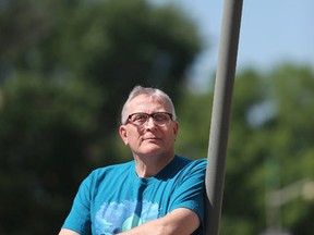 Al Racicot outside his office on Friday July 10, 2015. He got a parking ticket in the Parkdale Market a month ago where the no parking sign was completely obscured by trees. He fought the ticket and won.    
Tony Caldwell/Ottawa Sun