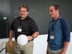 Photo supplied
Justin Schulte, right, explores hands-on ways of explaining particle physics with other EinsteinPlus participants at Perimeter Institute for Theoretical Physics.