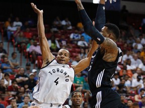 Raptors’ Norman Powell (left) gets fouled by Kings’ Eric Moreland in Las Vegas. Powell had 19 points in the game and backed that up with another 19 points in a win over the Bulls yesterday. (AP)