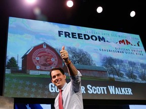 Wisconsin Gov. Scott Walker walks off the stage after speaking at the Freedom Summit in Des Moines, Iowa, in a Jan. 24, 2015 file photo.   REUTERS/Jim Young/files