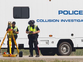 Edmonton Police Service officers investigate a fatal crash in this file photo. (Ian Kucerak/Edmonton Sun/Postmedia Network)