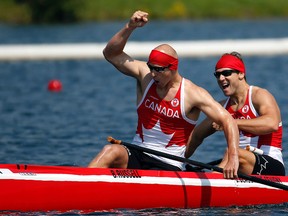 Gagbriel Beauchesne-Sevigny and Benjamin Russel of Canda celebrate winning the men's C2 1000m final during the 2015 Pan Am Games at Welland Pan Am Flatwater Centre on Monday, July 13, 2015. (Reuters/USA Today Sports)