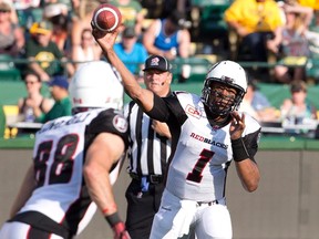 Ottawa Redblacks quarterback Henry Burris (1) makes the pass to Brad Sinopoli (88) against the Edmonton Eskimos during first half action in Edmonton, Alta., on Thursday July 9, 2015. THE CANADIAN PRESS/Jason Franson.