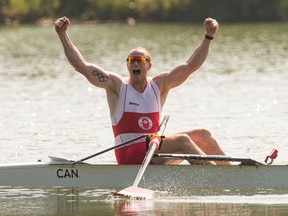 Kingston's Will Crothers celebrates his Canadian rowing crew's gold medal in the coxless four race at the 2015 Pan Am Games on the Royal Canadian Henley course in St. Catharines on Monday. (Bob Tymczyszyn/Postmedia Network)