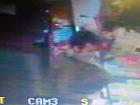 Kingston Police released an image from video surveillance of a robbery suspect wanted in connection with a robbery of a convenience store on Thomas Street Monday. Handout photo