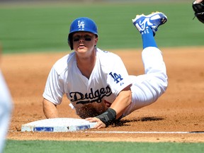 Dodgers rookie Joc Pederson has 20 home runs and 40 RBIs this season. His father Stu played many years in the minor leagues. (USA TODAY)