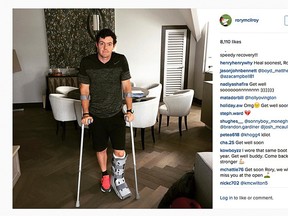 In this image released Monday July 6, 2015 by world number one golfer Rory McIlroy shows him as he poses on crutches and with his left leg in a medical support. (Rory McIlroy via AP)