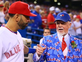 Hockey Night in Canada personality Don Cherry talks to Jose Bautista before the Toronto Blue Jays faced the Boston Red Sox on July 1, 2015 at the Rogers Centre in Toronto. (DAVE ABEL/Toronto Sun files)