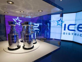 Stanley Cup replicas and video screens are visible in Ice HQ, 10420 - 103 Ave., the official headquarters of the newly named Ice District in downtown Edmonton Alta. on Monday July 13, 2015. (DAVID BLOOM/Edmonton Sun)