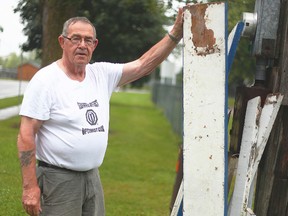 Bob Dinsmore from the Optimist Club shows the picnic tables at the baseball diamond in Seaforth that have been damaged July 7, 2015.