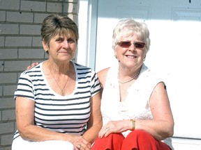 St. Clair Township's Bev Sullivan, left, and England's Margaret Green have been pen pals for 58 years. Green is visiting Sullivan and Canada for three weeks this summer. (David Gough, Postmedia Network)