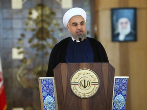 Iran's President Hassan Rouhani addresses the nation in a televised speech after a nuclear agreement was announced in Vienna, in Tehran, Iran, on July 14, 2015. (AP Photo/Ebrahim Noroozi)