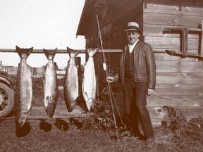 Rufus Gibbs and his catch of day—Chinook Salmon.  With permission of Syd Pallister, Gibbs-Delta Tackle