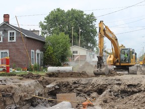 Construction work continues on Yeomans Street in Belleville Tuesday afternoon. Residents of the street say they are learning to cope with the ongoing construction.
