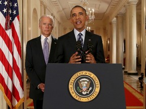 U.S. President Barack Obama delivers a statement about the nuclear deal reached between Iran and six major world powers with Vice President Joe Biden at his side during an early morning address to the nation from the East Room of the White House in Washington, July 14, 2015.    REUTERS/Andrew Harnik/Pool