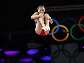Rosie MacLennan competes on the trampoline during the Summer Olympics in 2012. (AFP/PHOTO)