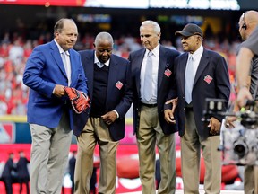 From left: Johnny Bench, Hank Aaron, Sandy Koufax and Willie Mays take centre stage at the Great American Ball Park in Cincinnati last night. The four were introduced as the greatest living players prior to the all-star game. (The Associated Press)