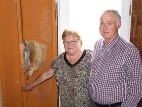 Ken and Lise Sinclair were rattled when a black bear made its way into their enclosed porch and when it found itself trapped, tried to escape by any means available to it, including the family home.