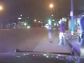 A screengrab of video from police dashboard cameras that captured officers shooting Ricardo Diaz-Zeferino in a Los Angeles suburb two years ago. (AP video screengrab)