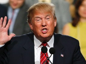 Republican presidential candidate Donald Trump speaks before a crowd of over 3,500 in Phoenix on July 11, 2015. (AP Photo/Ross D. Franklin)