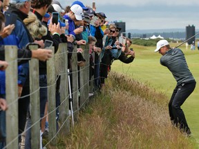 United States’ Jordan Spieth plays from the rough on hole 16 during a practice round at the British Open Golf Championship at the Old Course, St. Andrews, Scotland. (AP Photo/David J. Phillip)