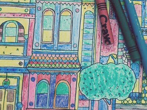 This June 17, 2015 photo shows a coloured-in page from the adult colouring book "Splendid Cities: Color Your Way to Calm," by Rosie Goodwin and Alice Chadwick, Hachette Livre (Editions Marabout). It's one of dozens of adult colouring books being marketed these days as a way to relieve stress. (Beth J. Harpaz/Little Brown and Company via AP)