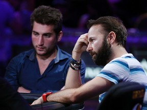 Daniel Negreanu, right, and Federico Butteroni compete at the World Series of Poker main event Tuesday, July 14, 2015, in Las Vegas. (AP Photo/John Locher)