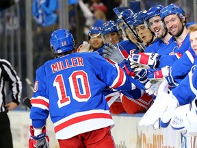 J.T. Miller will skate with the New York Rangers again after reaching a deal with the team for next season. (Elsa/AFP)