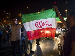 Iranians celebrate on the streets following a nuclear deal with major powers, in Tehran July 14, 2015. Iran's president Hassan Rouhani said on Tuesday a nuclear deal with major powers would open a new chapter of cooperation with the outside world after years of sanctions, predicting the "win-win" result would gradually eliminate mutual mistrust.  REUTERS/TIMA